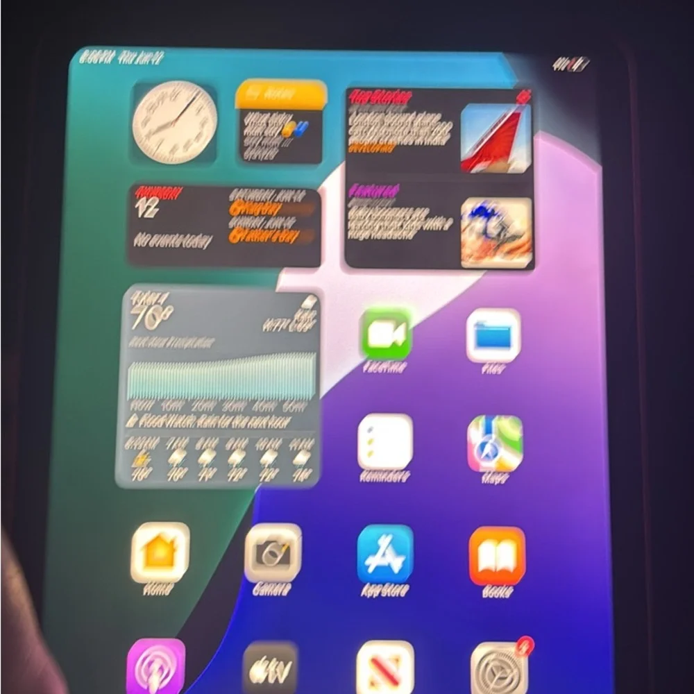 Apple Tablet with Black and Purple Display